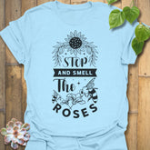 Light Blue t-shirt featuring the design The Roses printed in artistic flower, floral graphic tee.