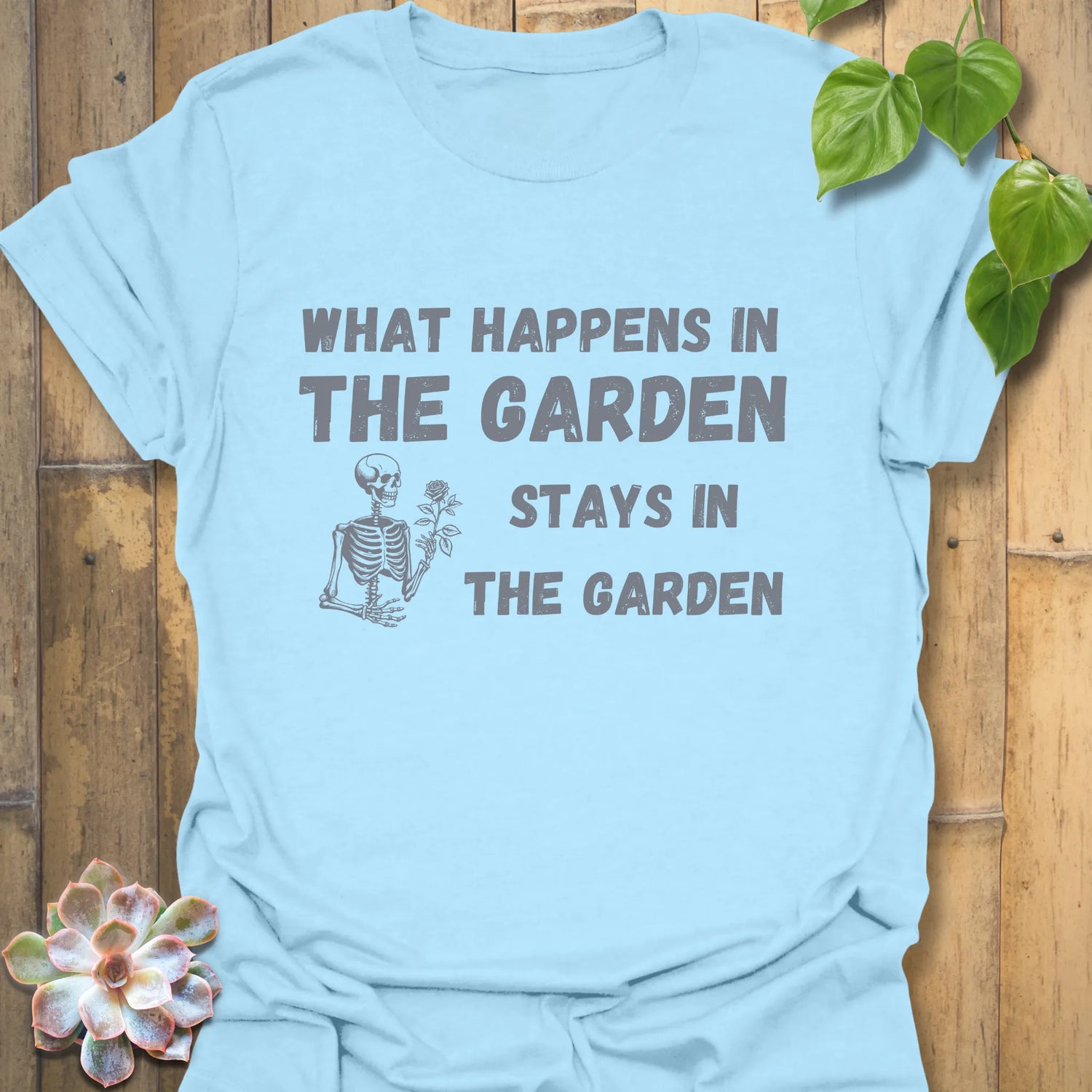 Light Blue t-shirt featuring the design What Happens in the Garden Stays in the Garden, casual garden graphic tee.