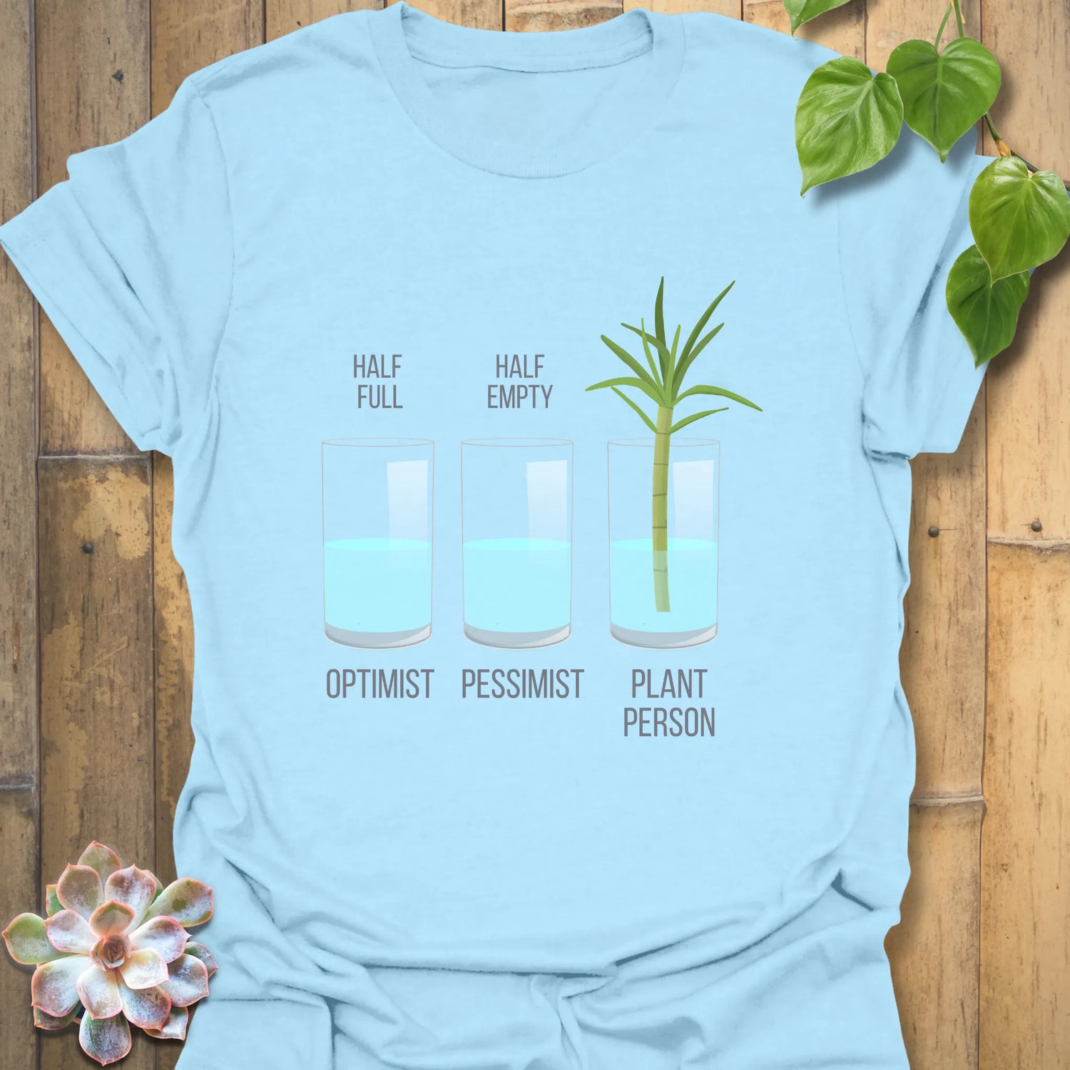 Light blue t-shirt featuring the design Plant Person printed, eco-style plant enthusiast shirt.