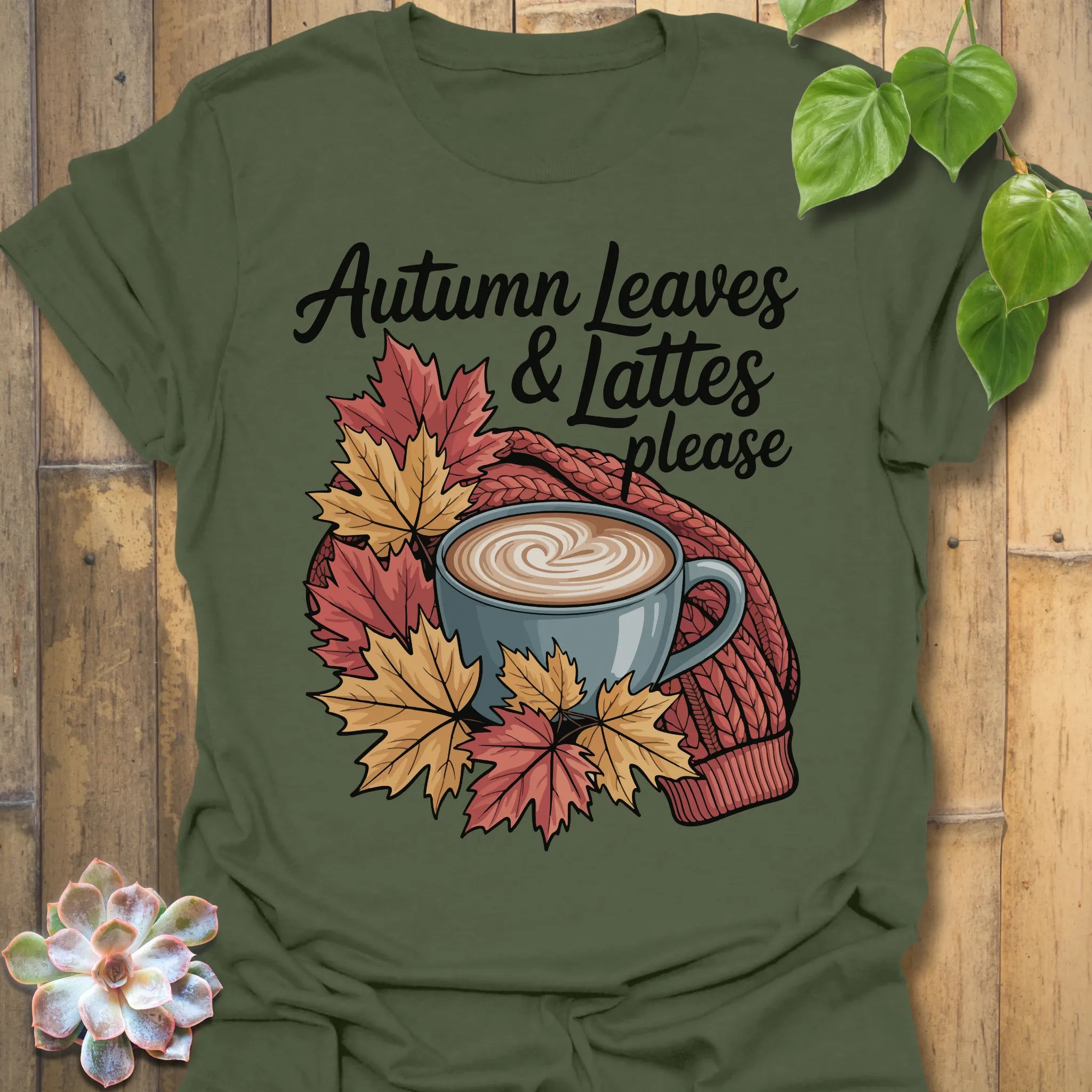 Military Green t-shirt featuring the design Autumn Leaves &amp; Lattes printed in cosy fall shirt for coffee lovers.