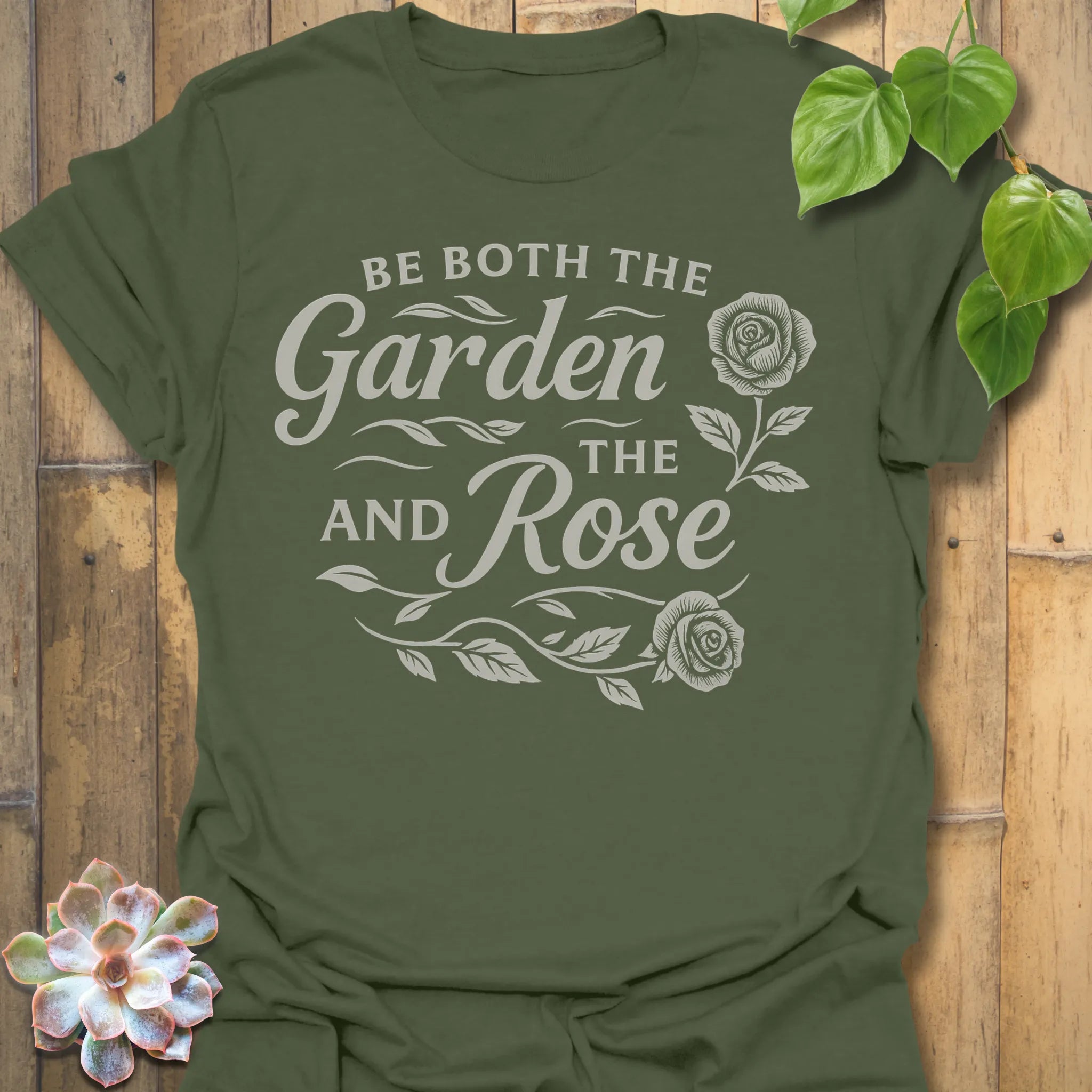 Military Green t-shirt featuring the design Garden And The Rose printed in soft floral tones, stylish plant lover shirt.