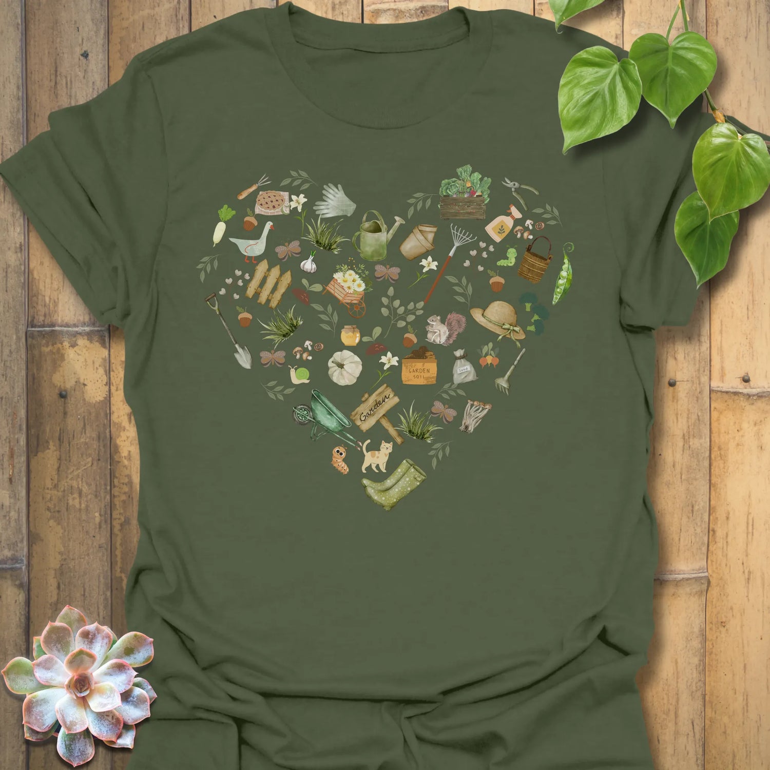 Military Green t-shirt featuring the design Gardening Loveheart printed in gardening graphic, perfect for plant lovers.