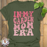 Military Green t-shirt featuring the design In My Garden Mom Era printed in bold letters, gardening shirt for moms.