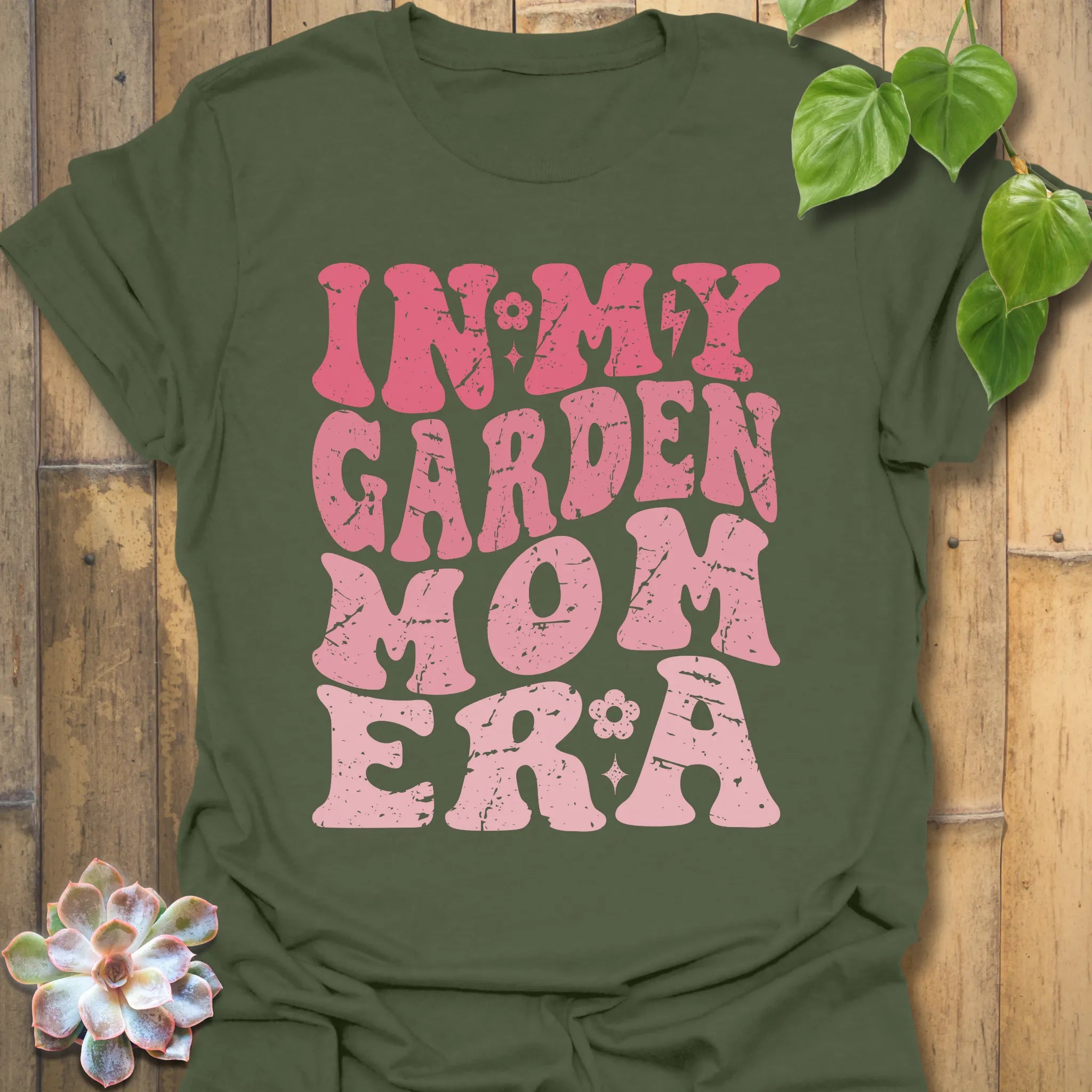 Military Green t-shirt featuring the design In My Garden Mom Era printed in bold letters, gardening shirt for moms.