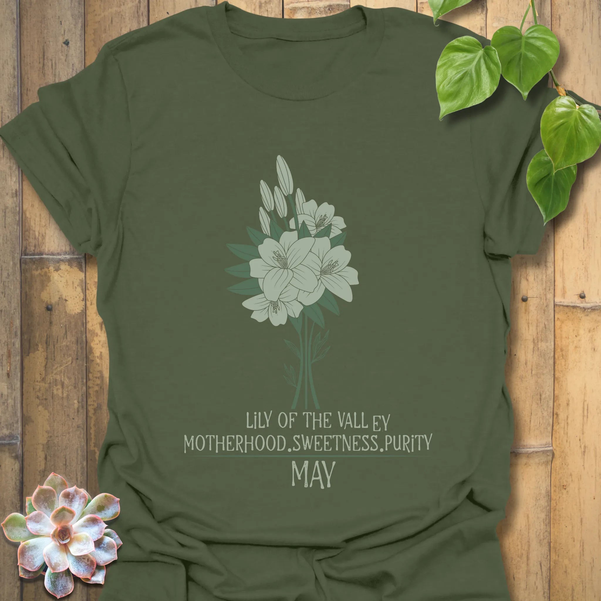 Military Green t-shirt featuring the design May Lily of the Valley with Rose flower print, a nature-inspired botanical shirt for floral outfit enthusiasts.