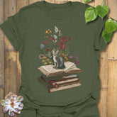 Military Green t-shirt featuring the design Whiskers & Words printed in books and cats with flowers, cat lover reading shirt.