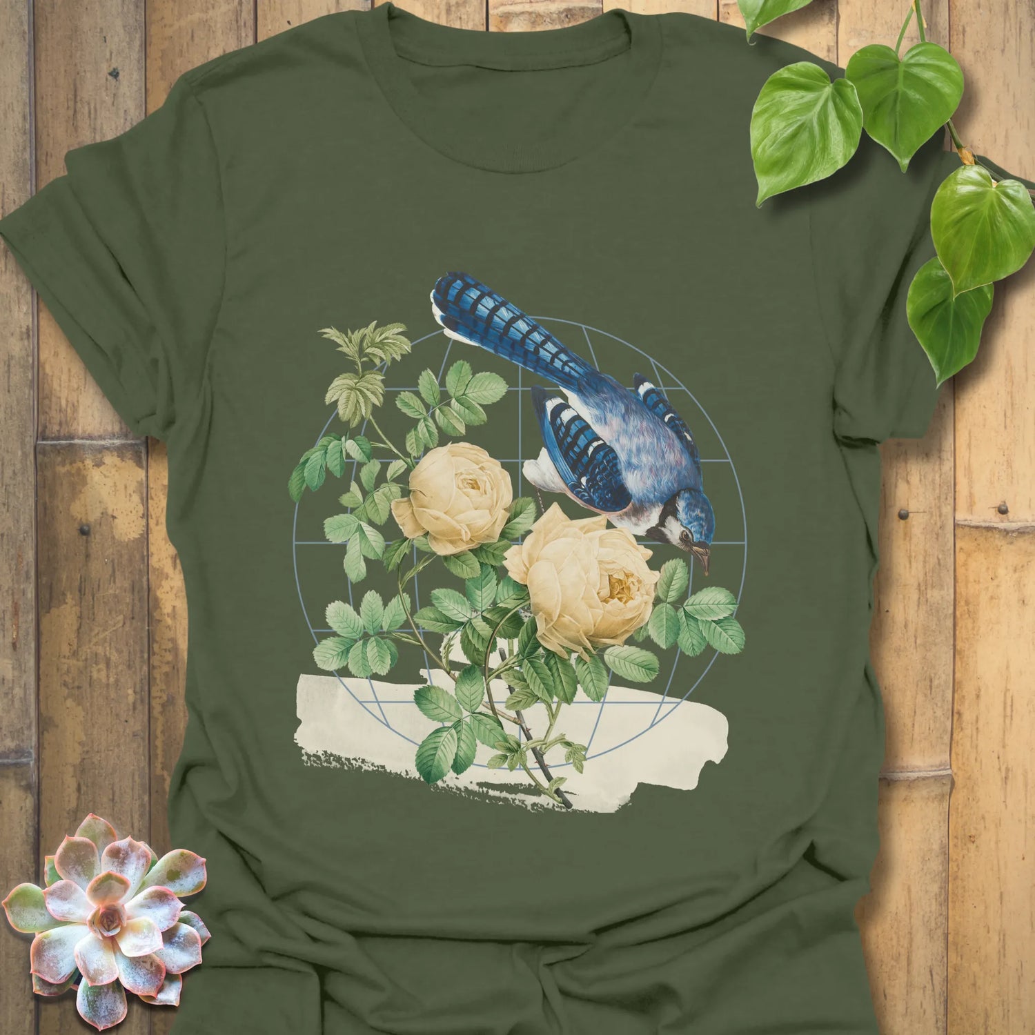 Military green t-shirt featuring the Botanical Flight design with a bird and flower print