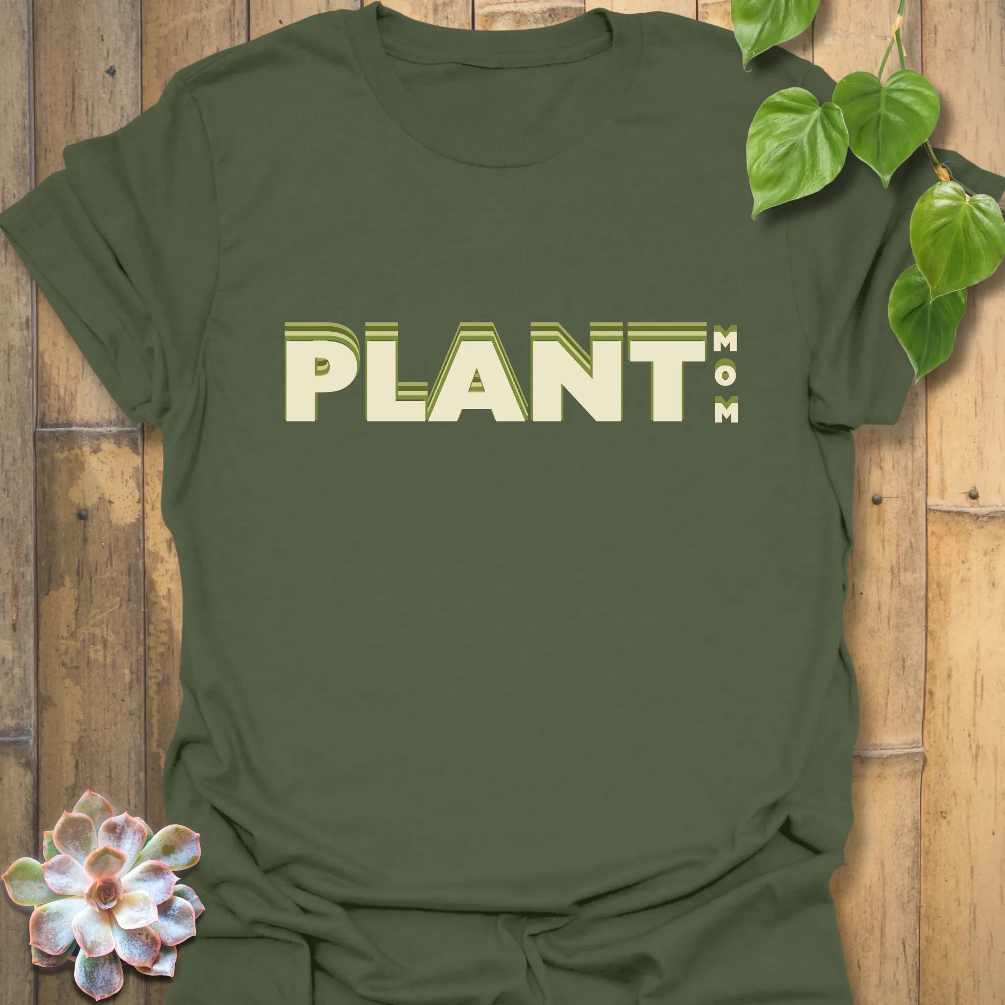 Military green t-shirt featuring the design Plant Mum, a trendy plant mom shirt.