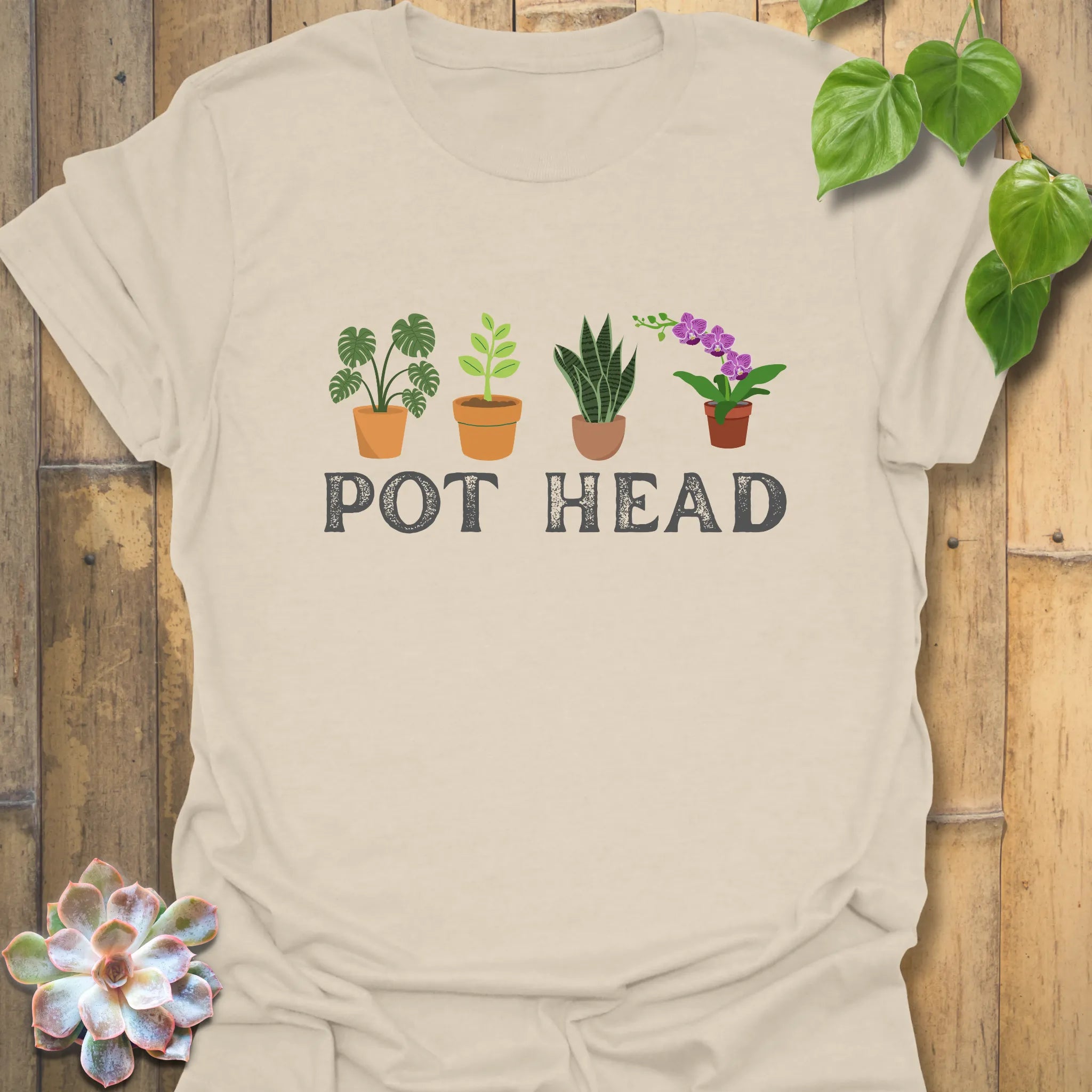 Natural t-shirt featuring the design Pot Head with flowers in a pot, aesthetic plant lover shirt.