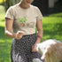 Natural t-shirt with “Plant, Dog, Coffee” design – eco style tee for dog lovers, coffee drinkers, and nature fans.