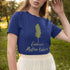 Navy blue t-shirt with the “Embrace Mother Nature” design and a small leaf print
