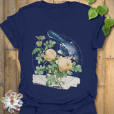 Navy t-shirt featuring the Botanical Flight design with a bird and flower print