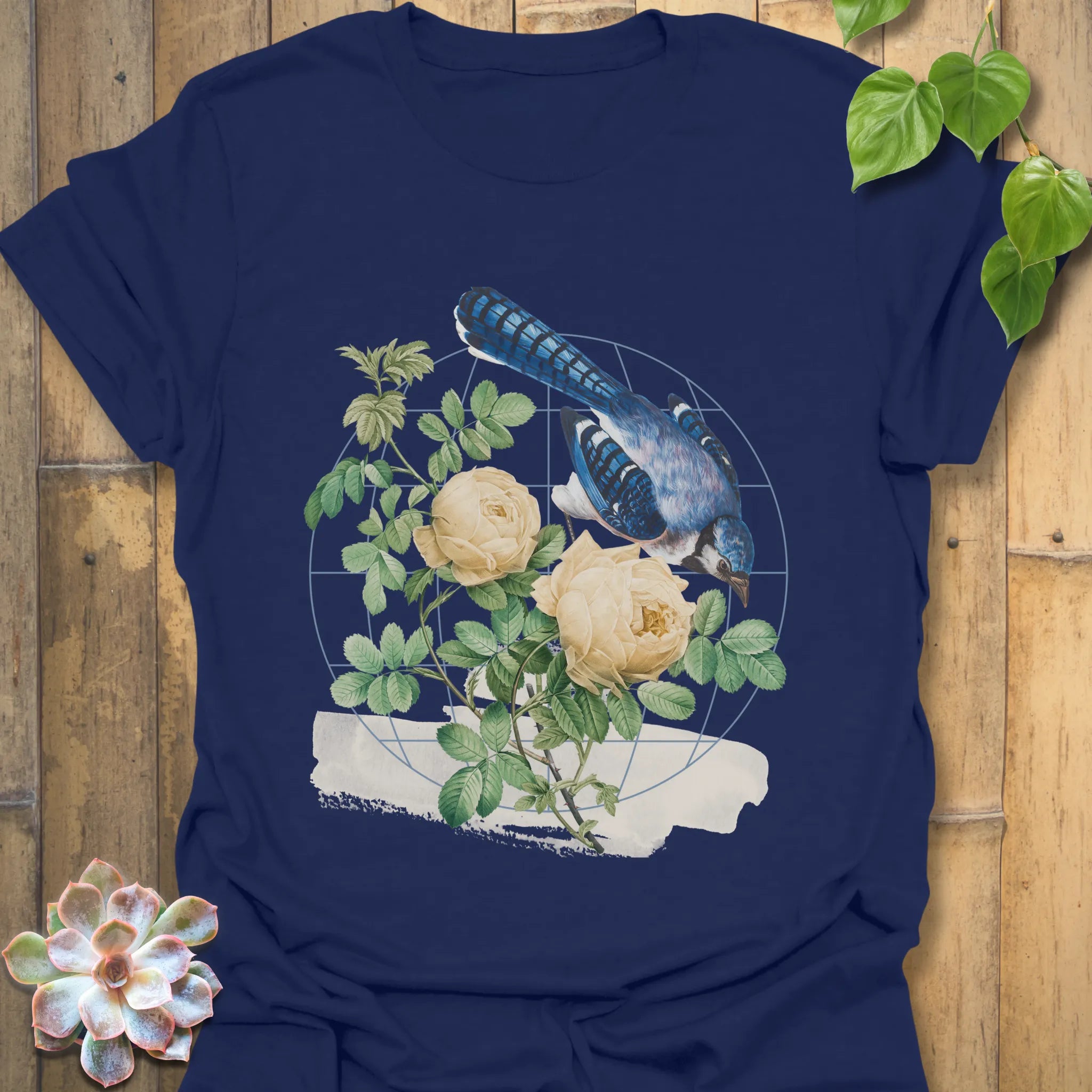Navy t-shirt featuring the Botanical Flight design with a bird and flower print