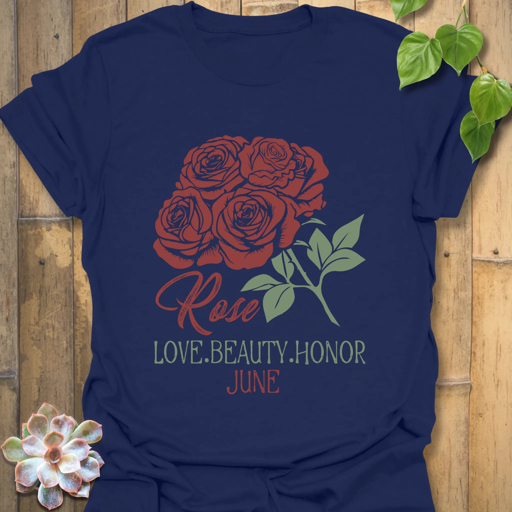 Navy t-shirt featuring the design June Rose with a rose flower print, a timeless floral tee perfect for everyday fashion.