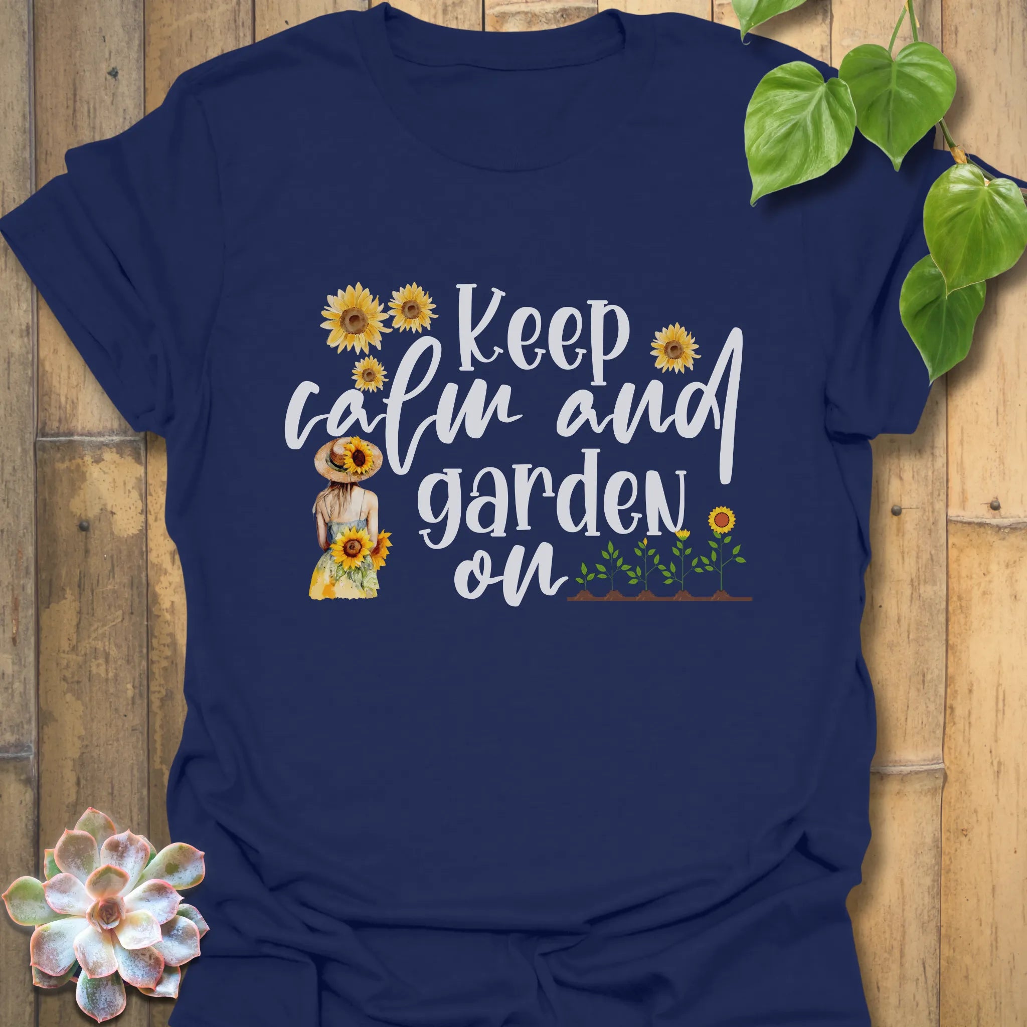 Navy t-shirt featuring the design Keep Calm and Garden On, garden slogan shirt.