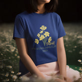 Navy t-shirt featuring the design March Daffodil with a print of flower Rose, a classic botanical flower tee.