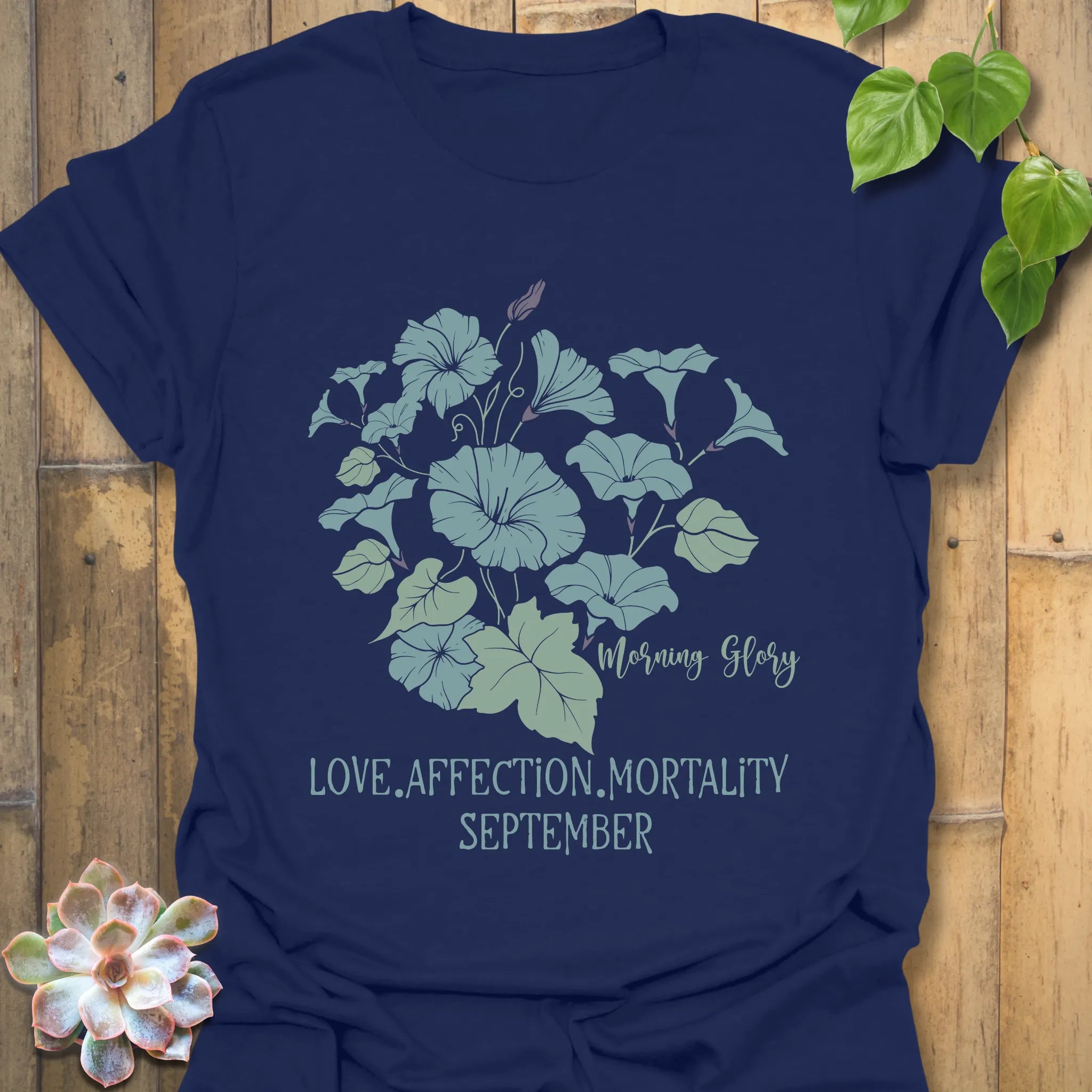 Navy t-shirt featuring the design September Morning Glory with a flower print, a deep blue floral graphic tee perfect for everyday fashion.
