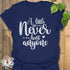 Navy t-shirt with the phrase A Little Dirt Never Hurt Anyone printed across the chest.