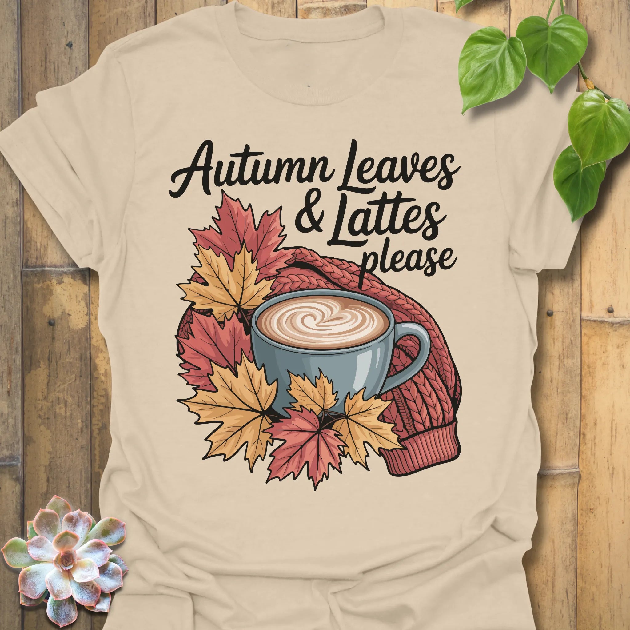 Sand t-shirt featuring the design Autumn Leaves &amp; Lattes printed in cosy fall shirt for coffee lovers.