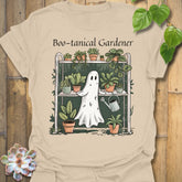 Sand t-shirt featuring the design Boo – Tanical Gardener printed in bold Halloween gardening shirt.