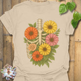 Sand t-shirt featuring the design Gerbera Bones printed in floral skeleton graphic tee.