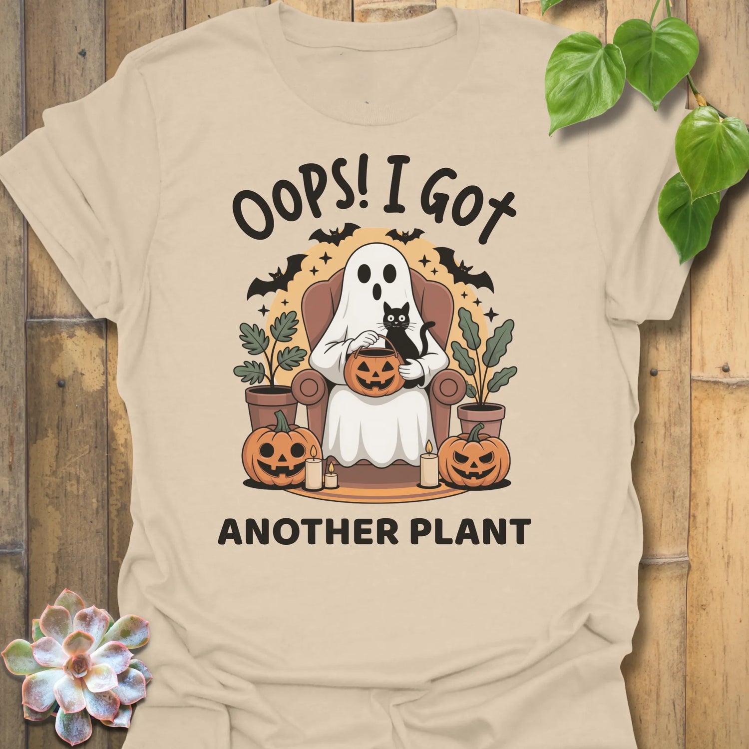 Sand t-shirt featuring the design Got Another Plant printed in bold black letters, halloween gardening tee.