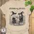 Sand t-shirt featuring the design Herbs & Hexes printed in bold black letters, botanical witch t-shirt.
