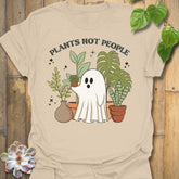 Sand t-shirt featuring the design Plants Not People printed in bold white letters, halloween plant lover graphic tee.