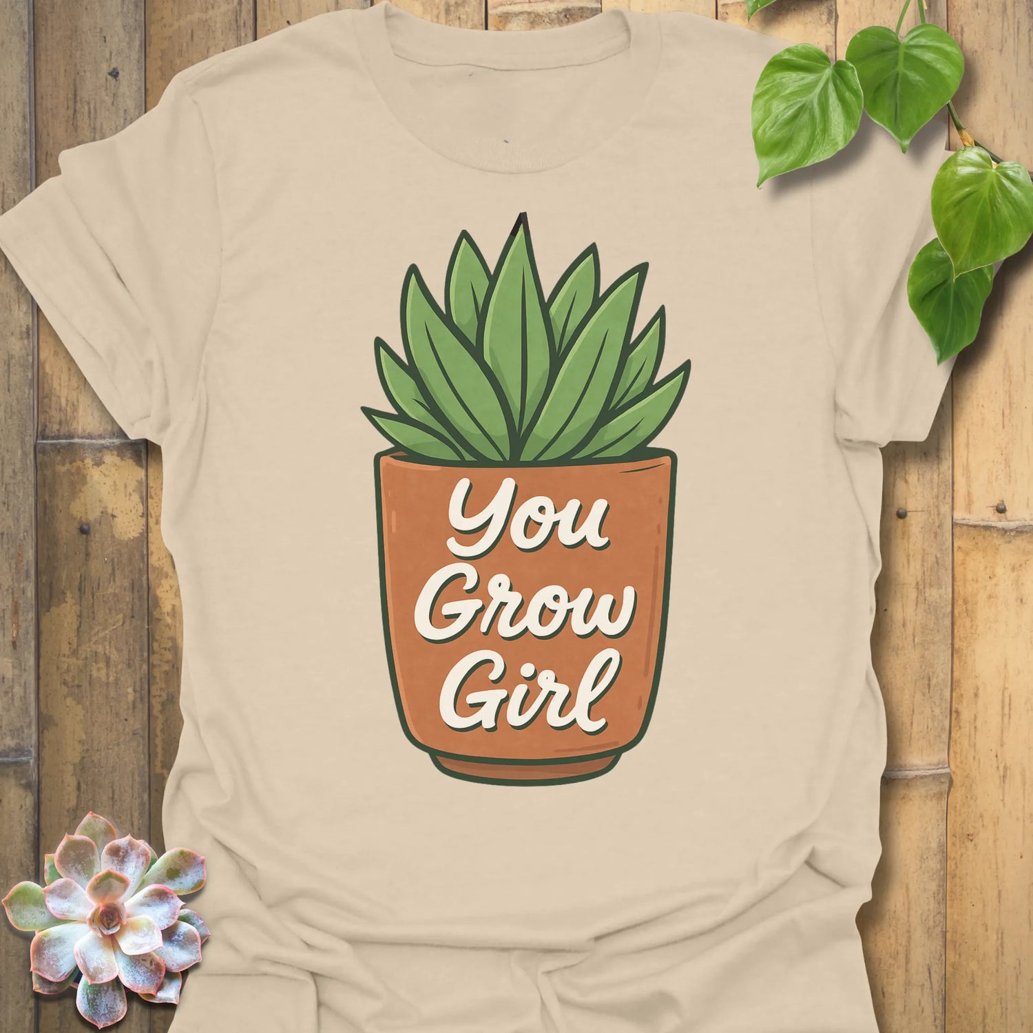 Sand t-shirt featuring the design You Grow Girl printed in inspiring plant lover shirt.