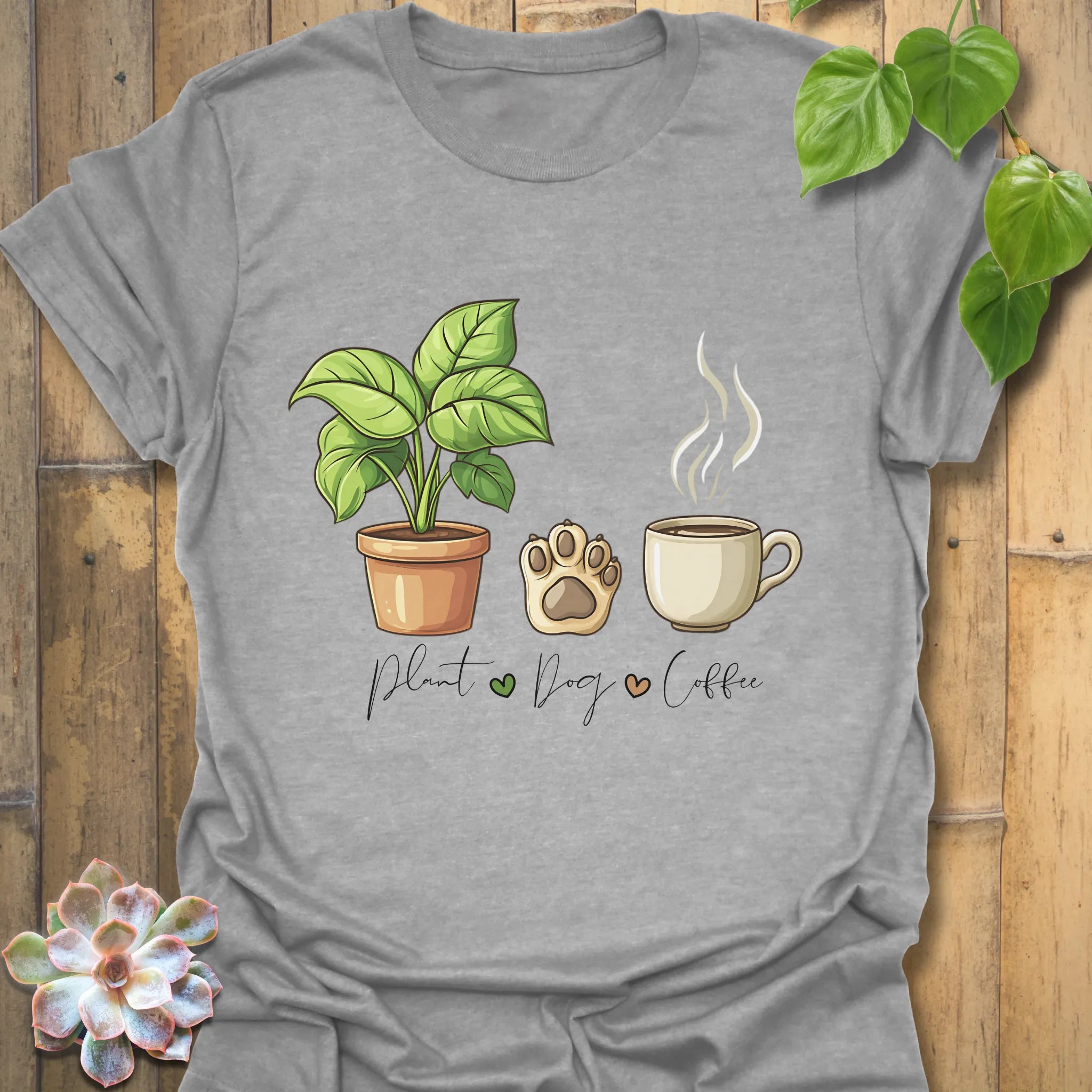 Sport Grey t-shirt with “Plant, Dog, Coffee” design – comfy casual tee for plant parents, dog lovers, coffee fans.