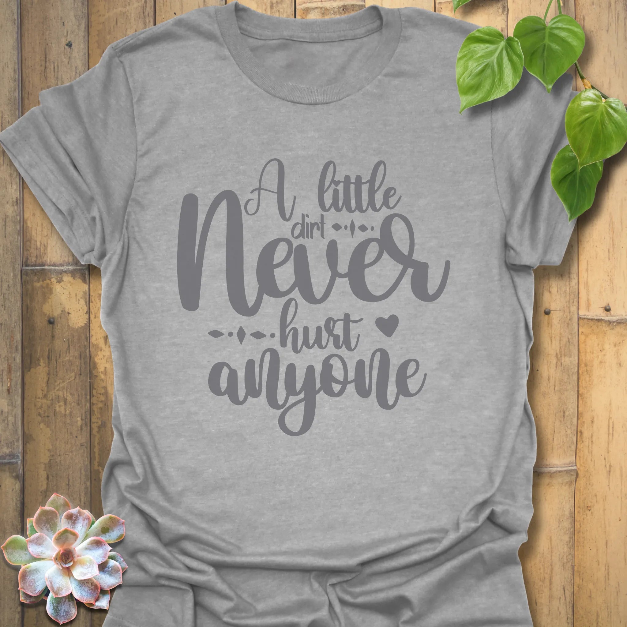 Sport grey gardening t-shirt featuring the design A Little Dirt Never Hurt Anyone in casual text print.