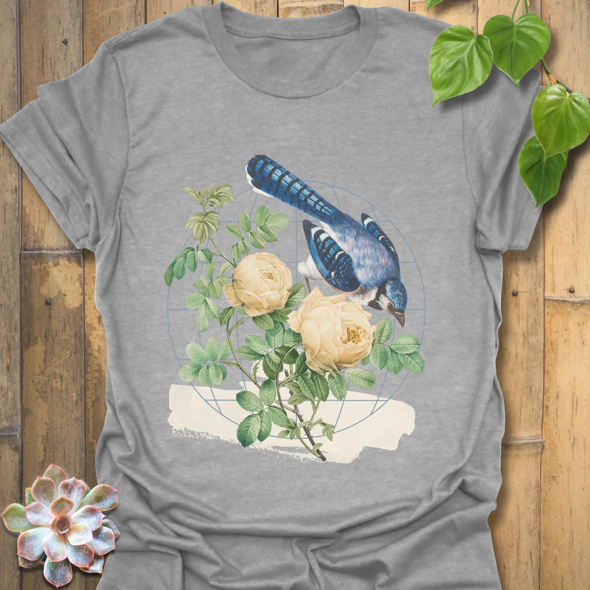 Sport grey t-shirt featuring the Botanical Flight design with a bird and flower print