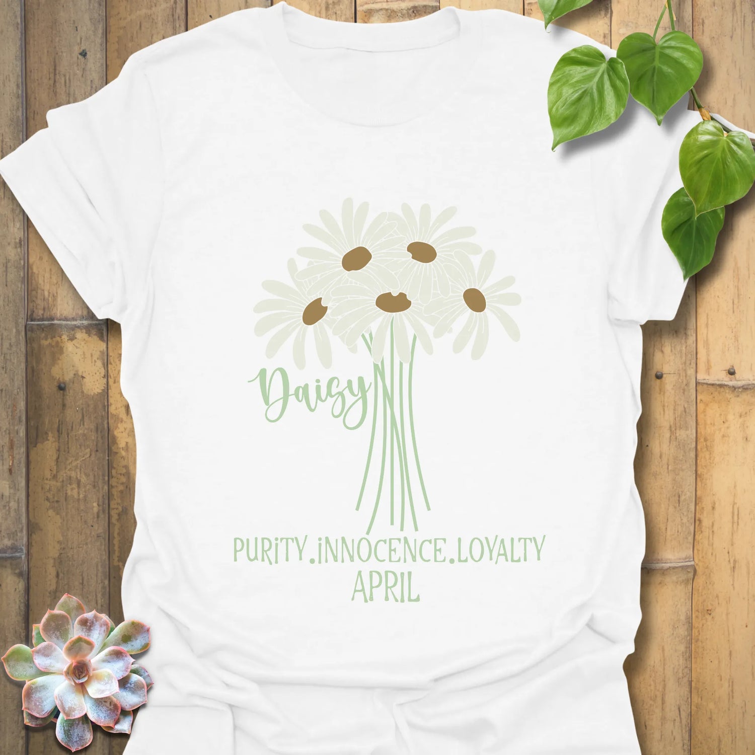 White t-shirt featuring the design April Daisy with a print of rose flower, a minimalist floral graphic perfect for casual spring outfits.