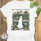 White t-shirt featuring the design Boo – Tanical Gardener printed in bold Halloween gardening shirt.