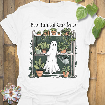 White t-shirt featuring the design Boo – Tanical Gardener printed in bold Halloween gardening shirt.