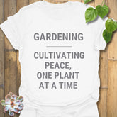 White t-shirt featuring the design Gardening Cultivating Peace One Plant at a Time printed, gardening graphic tee.