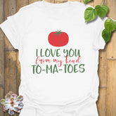 White t-shirt featuring the design I Love You From My Head TO-MA-TOES, funny vegetable graphic tee.