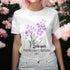 White t-shirt featuring the design July Larkspur with a delicate larkspur flower print, perfect for floral graphic tee lovers and botanical fashion enthusiasts.