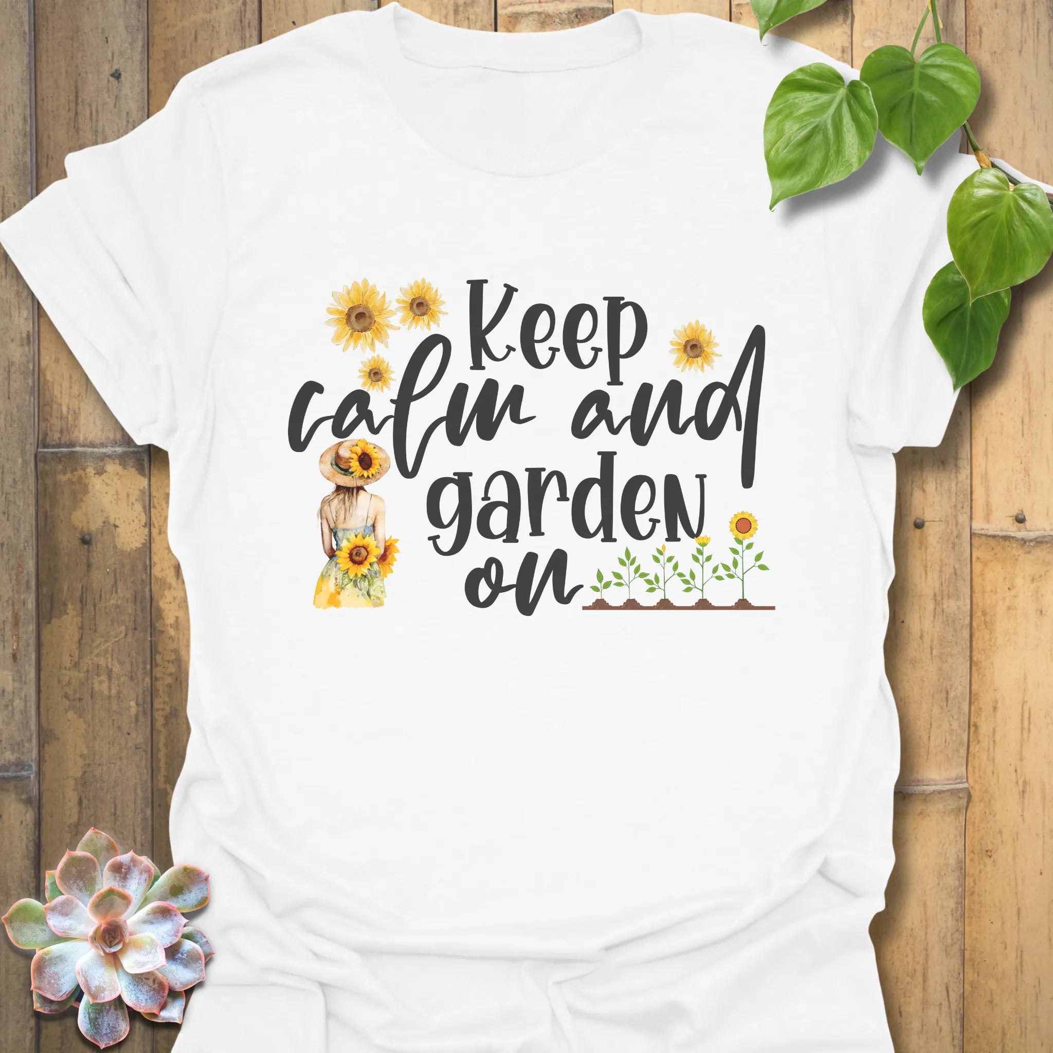 White t-shirt featuring the design Keep Calm and Garden On, perfect gardening shirt.