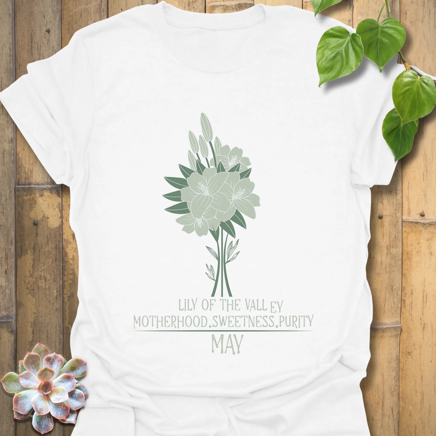 White t-shirt featuring the design May Lily of the Valley with Rose flower print, perfect for casual floral graphic tee lovers.