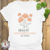 White t-shirt featuring the design October Marigold printed with a detailed marigold flower, perfect as a floral graphic tee.