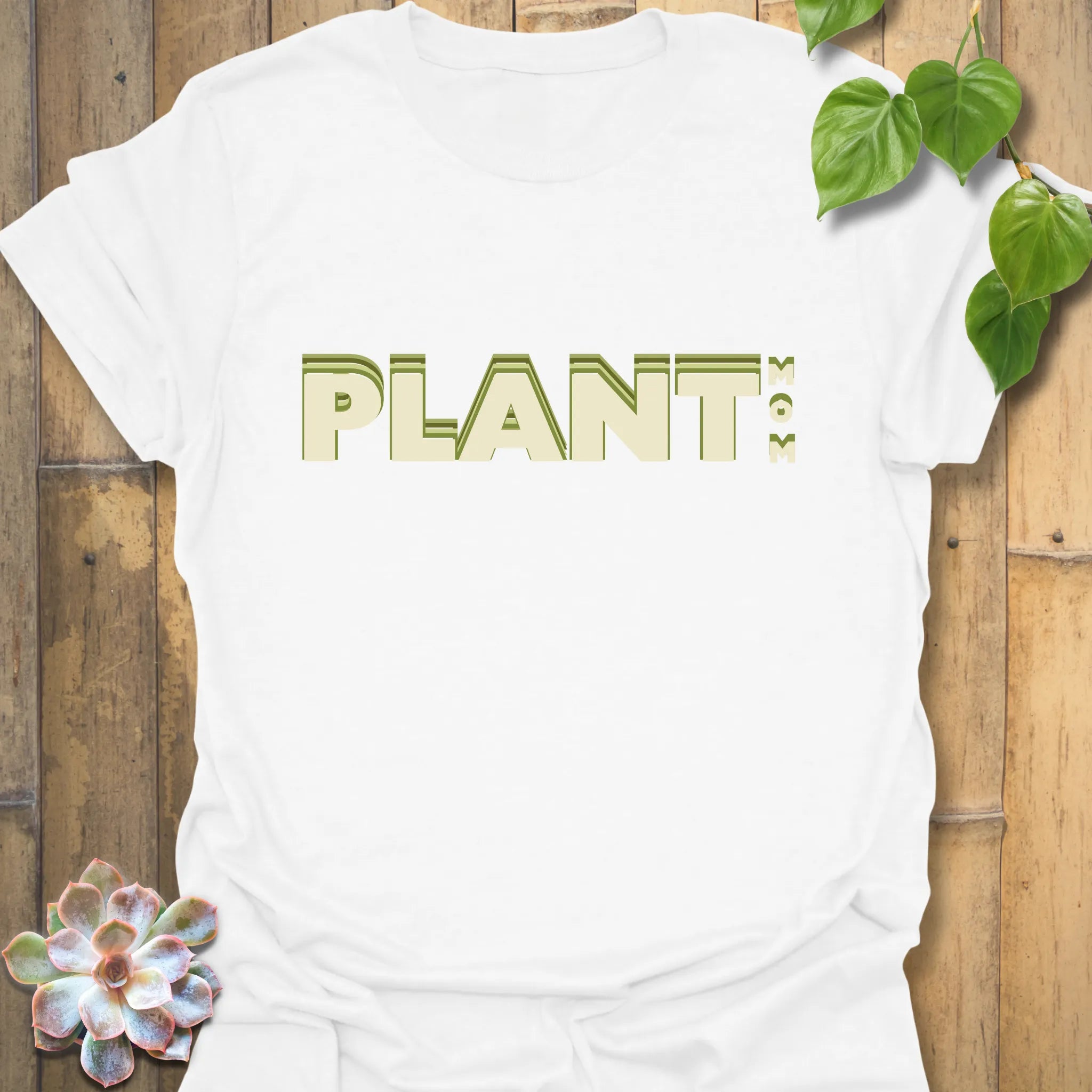 White t-shirt featuring the design Plant Mum, perfect for plant lover fashion.