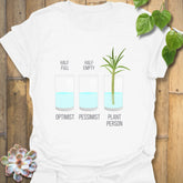 White t-shirt featuring the design Plant Person, eco-friendly botanical tee.