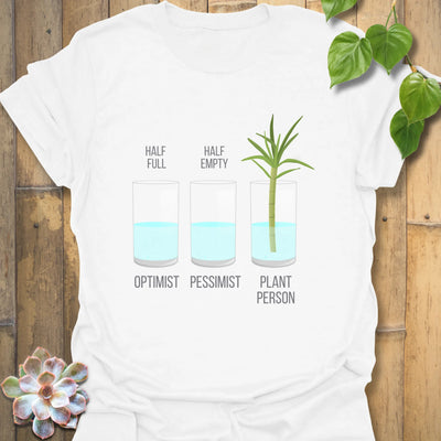 White t-shirt featuring the design Plant Person, eco-friendly botanical tee.