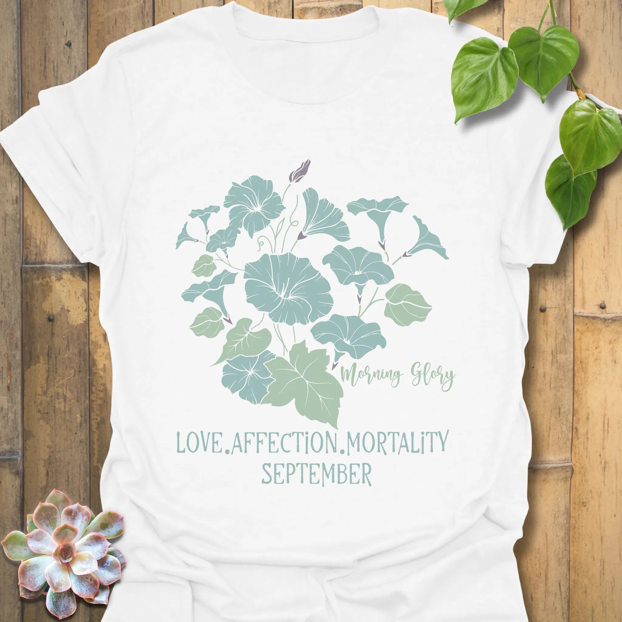 White t-shirt featuring the design September Morning Glory with a flower print, a stylish floral graphic tee perfect for everyday wear.