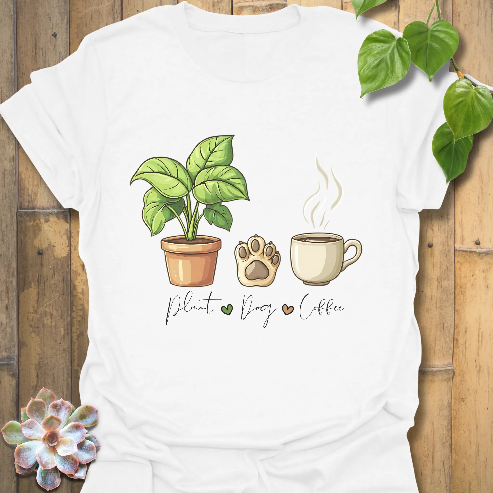 White t-shirt with “Plant, Dog, Coffee” design – casual graphic tee for plant lovers, dog owners, coffee fans.