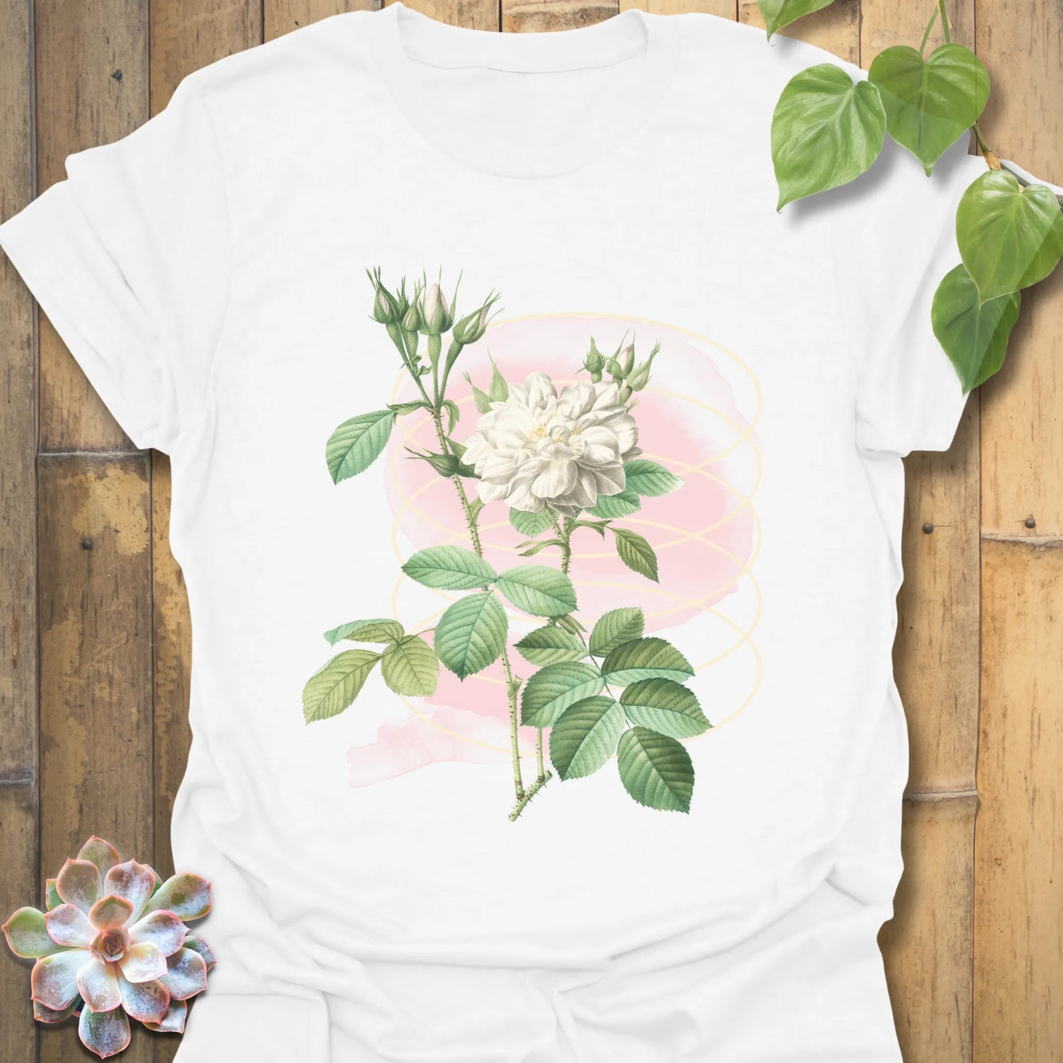 White t-shirt with the Blossom Whisper design showing a single elegant flower
