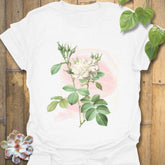 White t-shirt with the Blossom Whisper design showing a single elegant flower