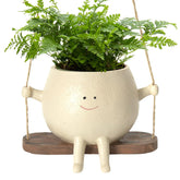 Charming Resin Face Planter with Swing
