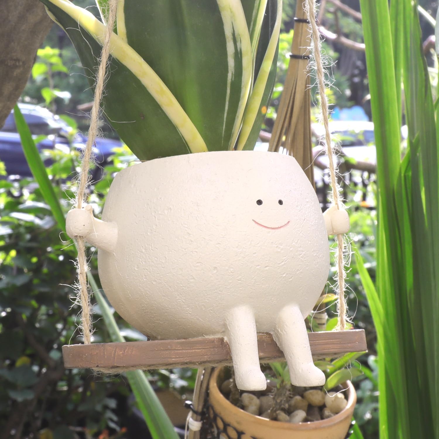 Charming Resin Face Planter with Swing